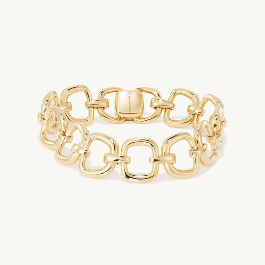 Dean Davidson gold link bracelet with oval links and central rectangular clasp