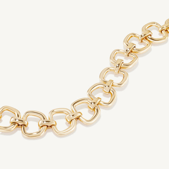 Dean Davidson gold link bracelet with chunky oval and rectangular links