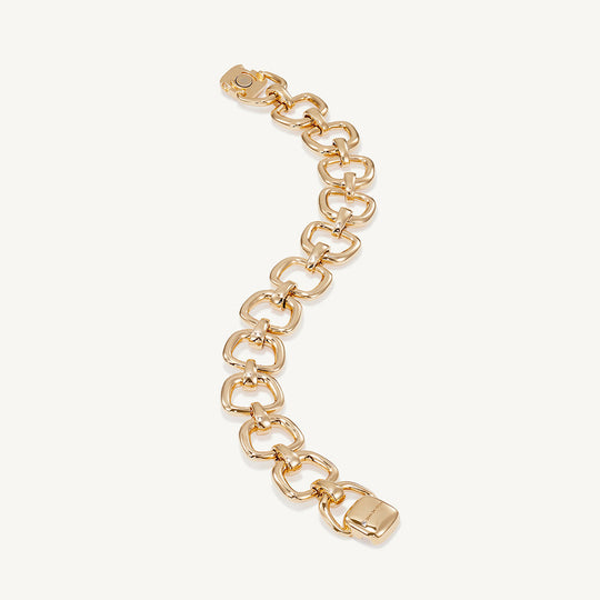 Gold link bracelet close-up with oval links and rectangular end clasp