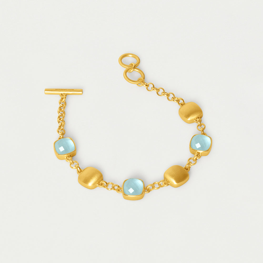 Gold-tone chain bracelet with iridescent light-blue bead stations and T-bar clasp