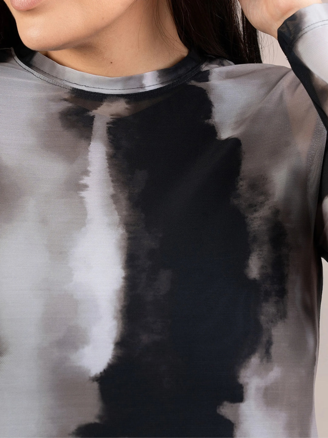 Close-up of crewneck tee with abstract watercolor print in graphite and light gray