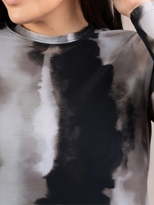 Close-up of crewneck tee with abstract watercolor print in graphite and light gray
