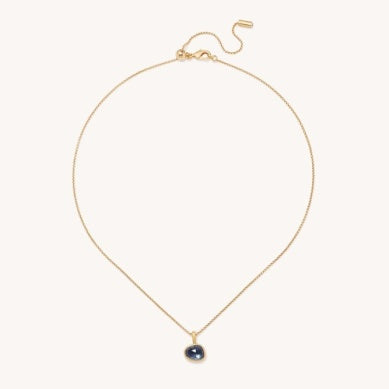 Gold-tone pendant necklace with small oval dark blue hematite stone