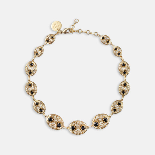 Gold filigree oval link necklace with black gemstone accents and lobster clasp