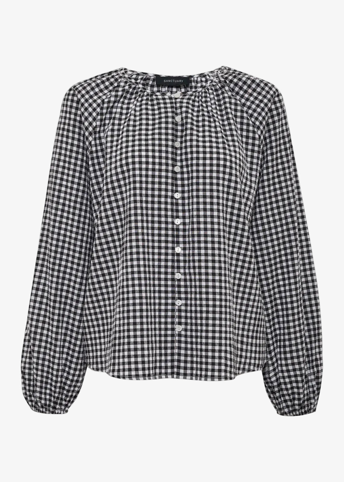 Black and white checkered blouse on a white background