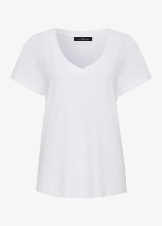 White t-shirt with a brand label on a white background