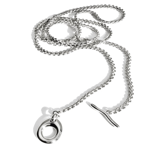 Silver chain necklace with circular pendant and toggle clasp closure