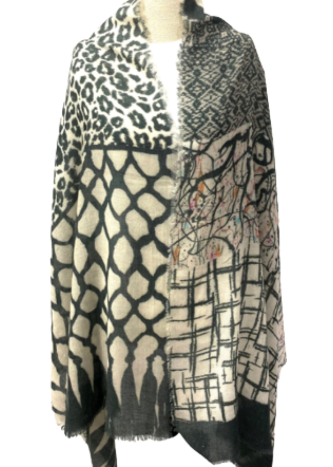 Black and white wool-silk scarf with fringe, bold mixed patterns and abstract motifs