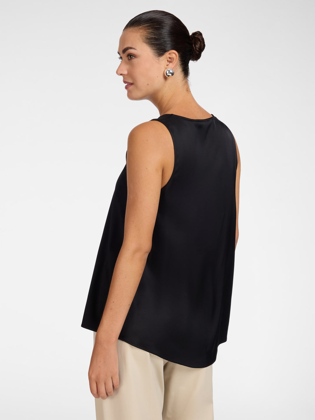 Black stretch satin V-neck camisole back view, sleeveless with clean armholes