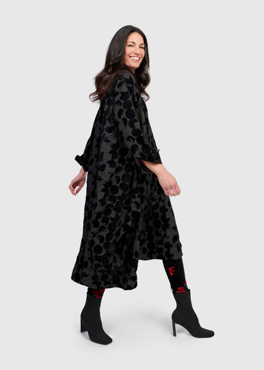 side view of plus size Alembika Crescent Taffeta Velvet Dot Long Button Front Dress in Black Crescent