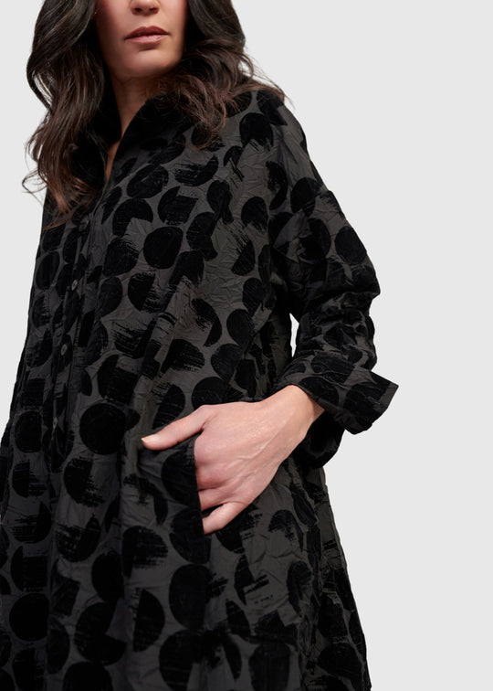 close up front view of plus size Alembika Crescent Taffeta Velvet Dot Long Button Front Dress in Black Crescent