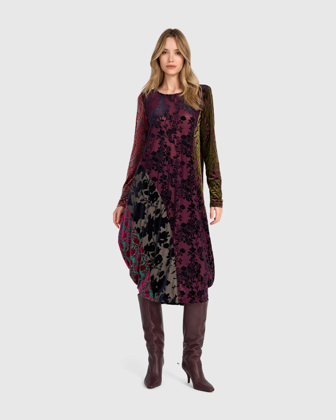 Burnout velvet mixed-print dress with long sleeves and straight, curved hemline at knee length.
