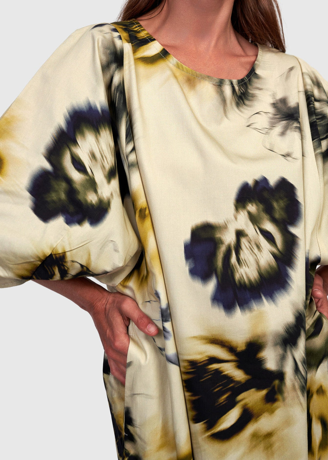 close up front view of plus size Alembika Knee Length Cotton Shift Dress with Puff Elbow Sleeve in Floral