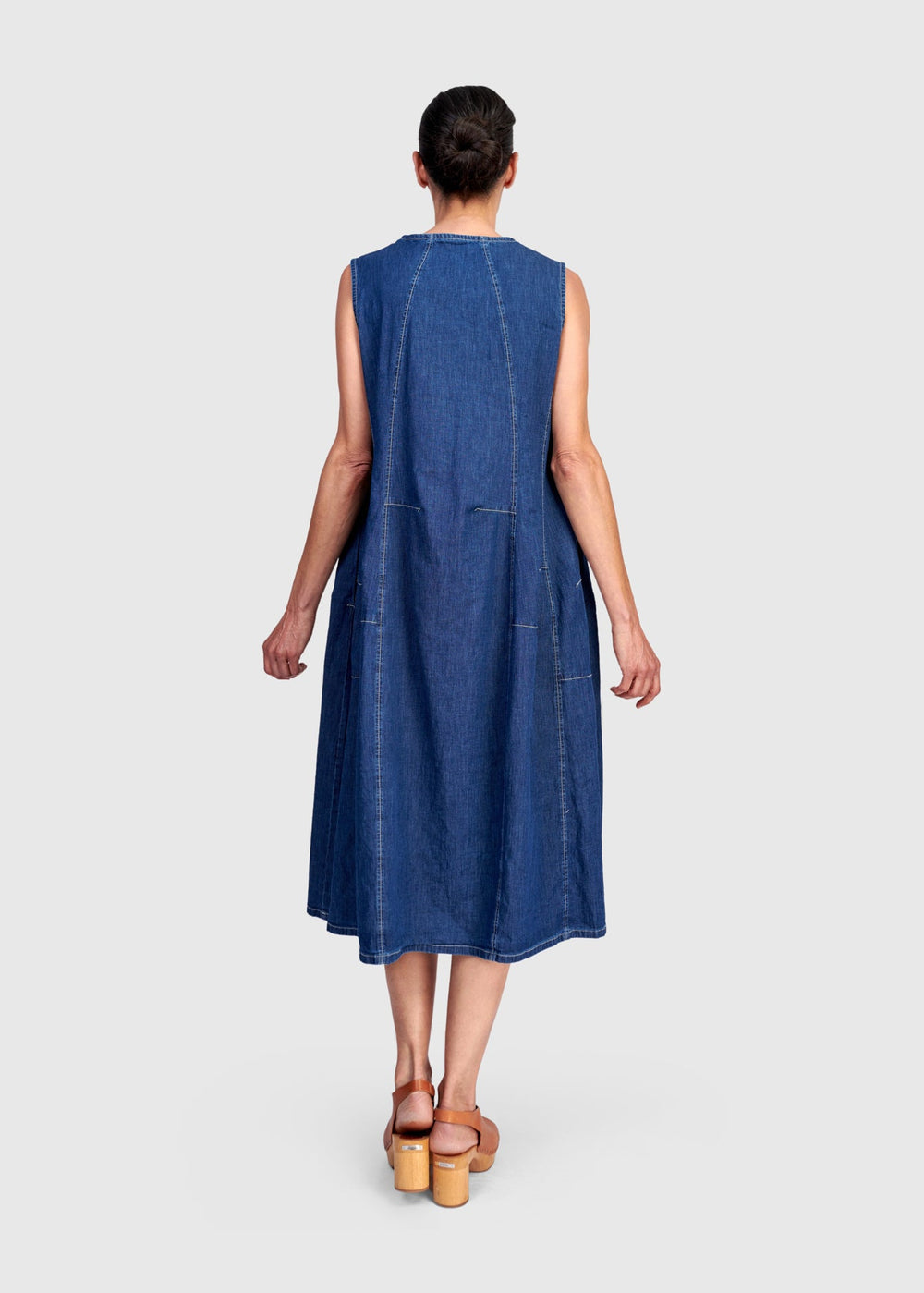 back view of plus size Alembika Denim A line Sleeveless Dress in Denim