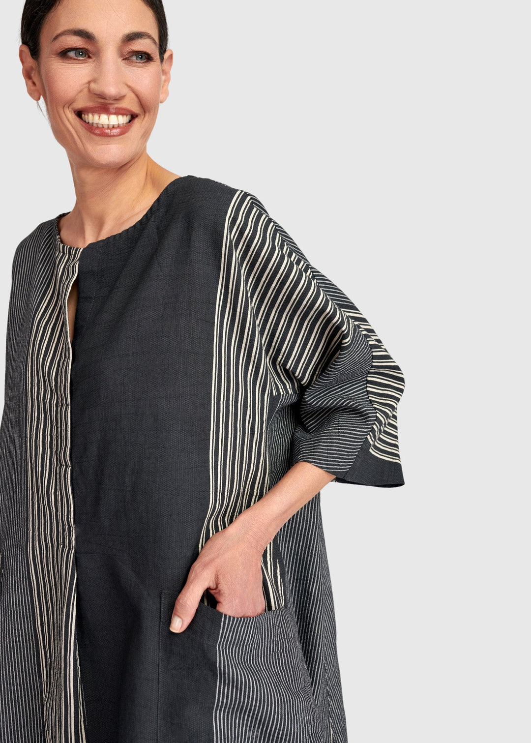 close up front view of plus size Alembika Maxi Striped Dress in Dark Bar