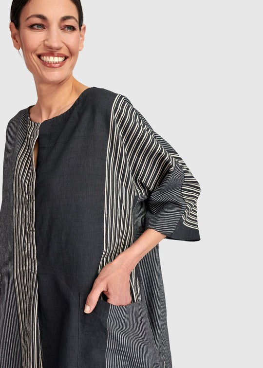 close up front view of plus size Alembika Maxi Striped Dress in Dark Bar