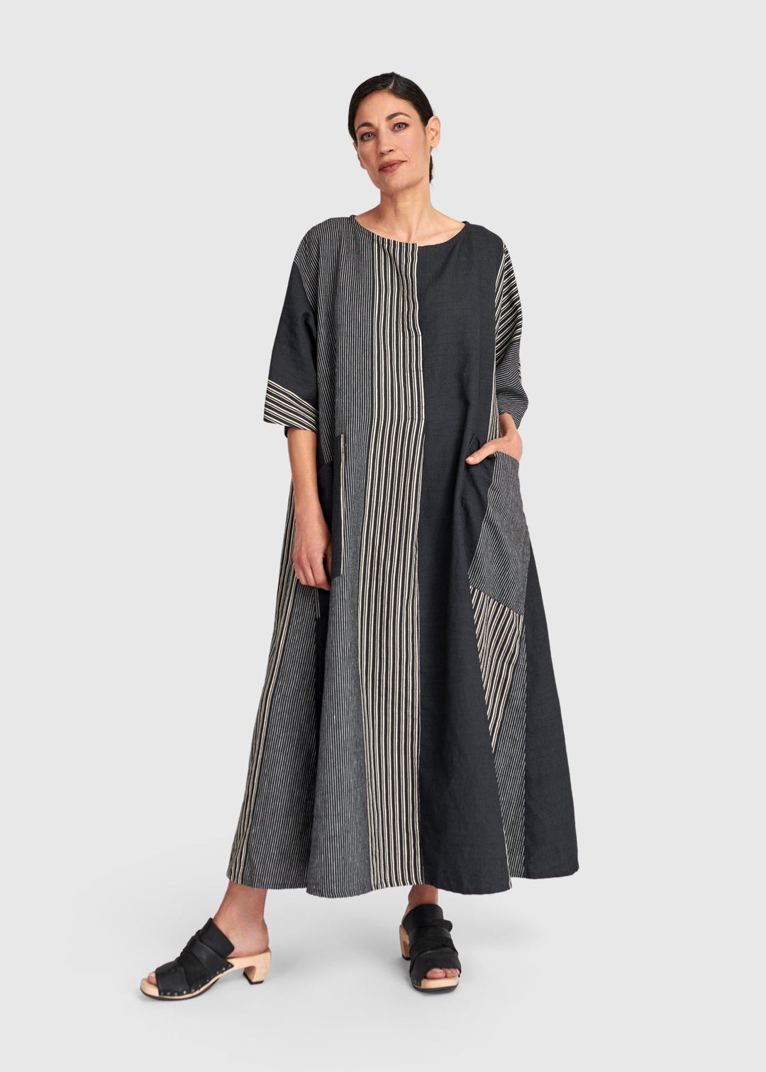 Front view of plus size Alembika Maxi Striped Dress in Dark Bar
