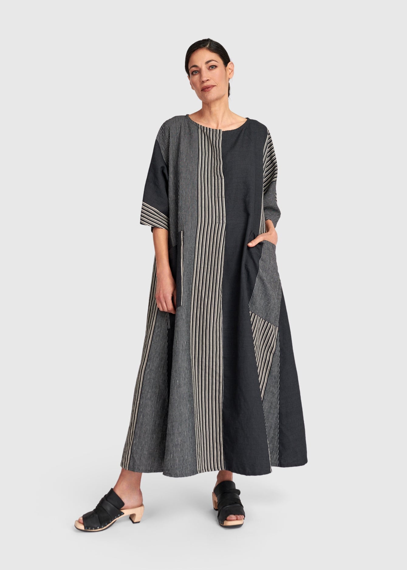 Front view of plus size Alembika Maxi Striped Dress in Dark Bar