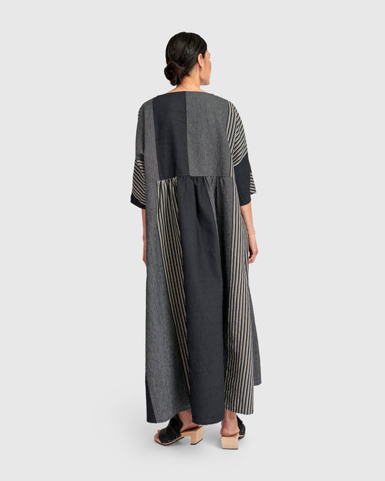back view of plus size Alembika Maxi Striped Dress in Dark Bar
