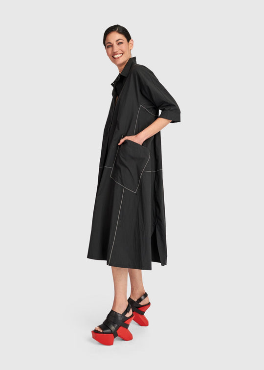 side front view of plus size Alembika Midi Cotton Shirt Dress with White Topstitching in Black