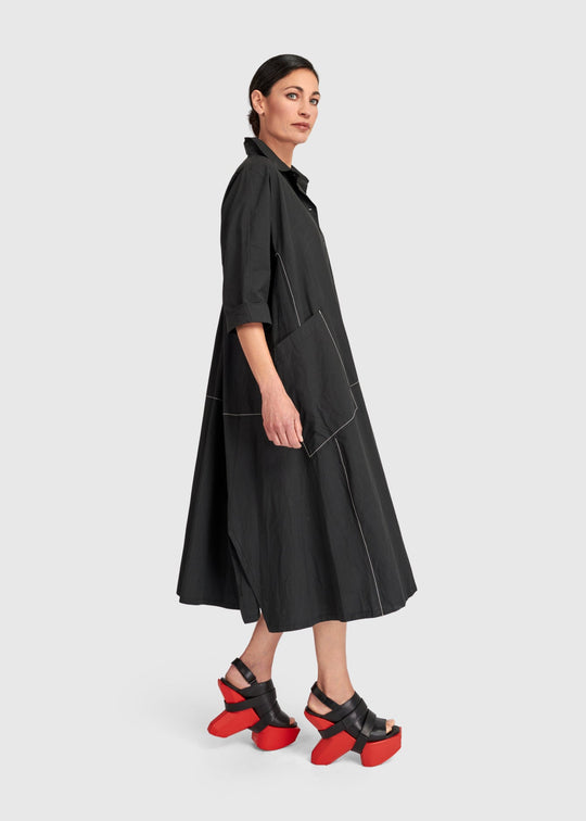 side view of plus size Alembika Midi Cotton Shirt Dress with White Topstitching in Black