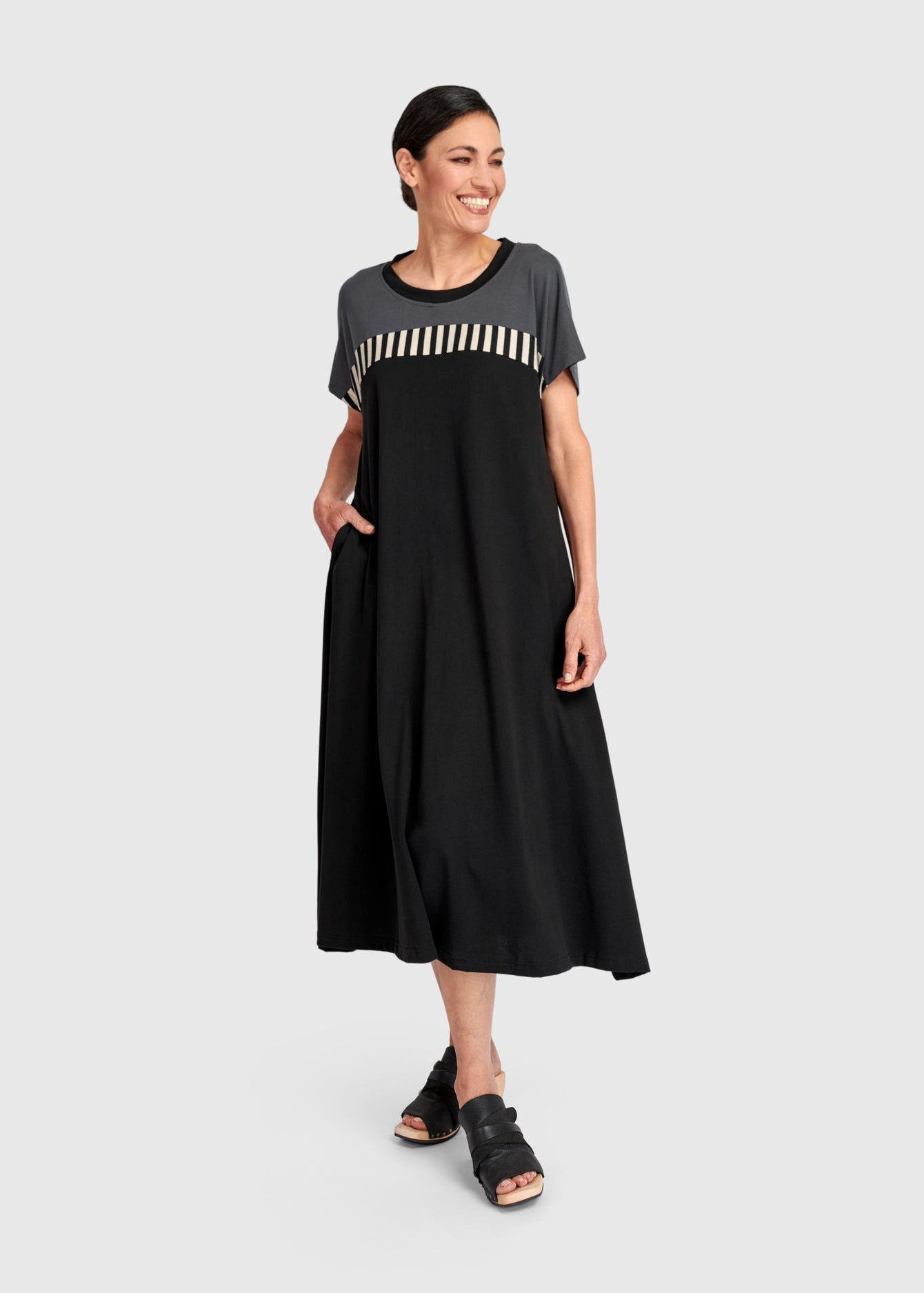 front view of plus size Alembika Mix Stripe Bodice Midi Dress in Cotton Jersey in Dark Bar