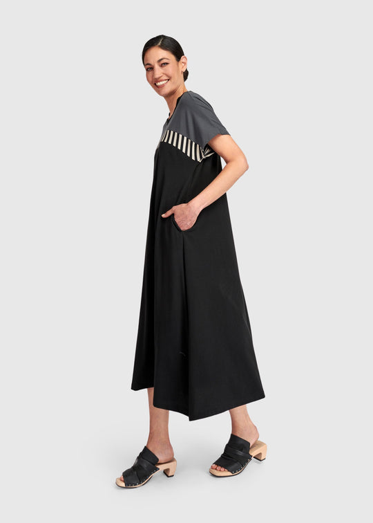 side view of plus size Alembika Mix Stripe Bodice Midi Dress in Cotton Jersey in Dark Bar