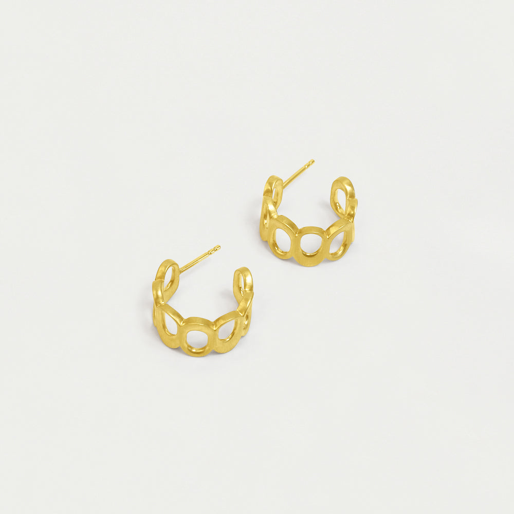 Pair of gold hoop earrings with open chain-link pattern and post backs