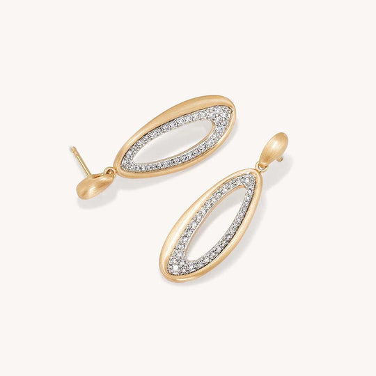 Open oval drop earrings in matte gold with pavé crystal inlay, shown as a pair