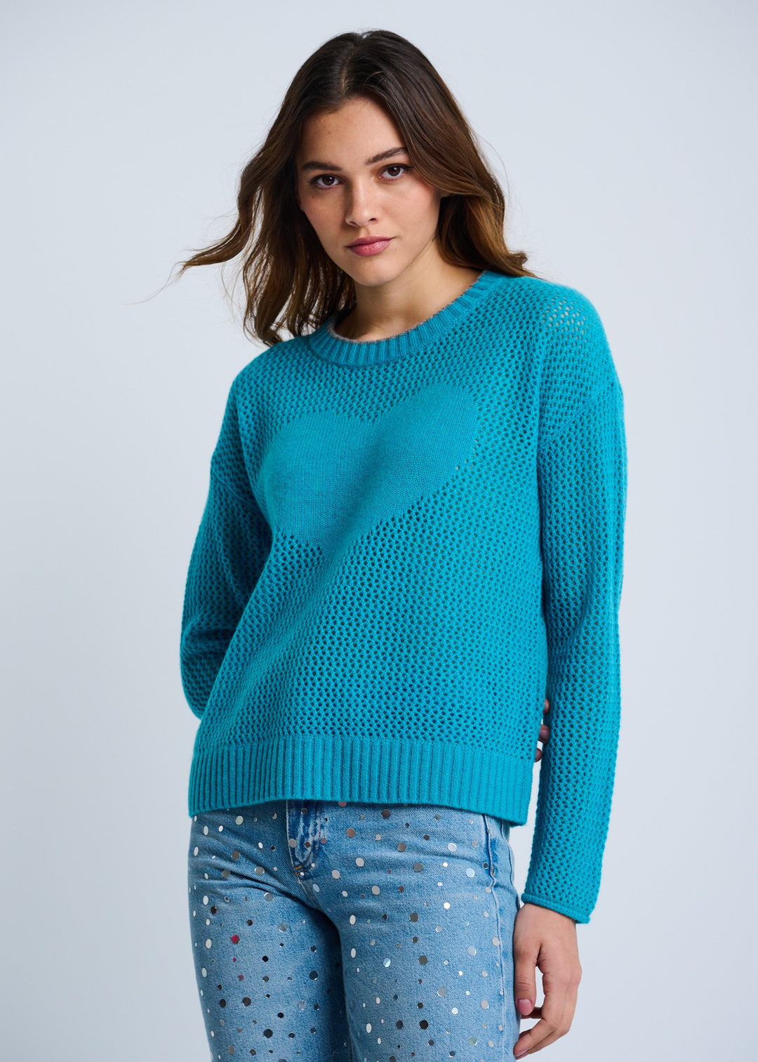 front view of plus size Lisa Todd Open For Love Waffle Knit Long Sleeve Sweater with Heart in Grotto