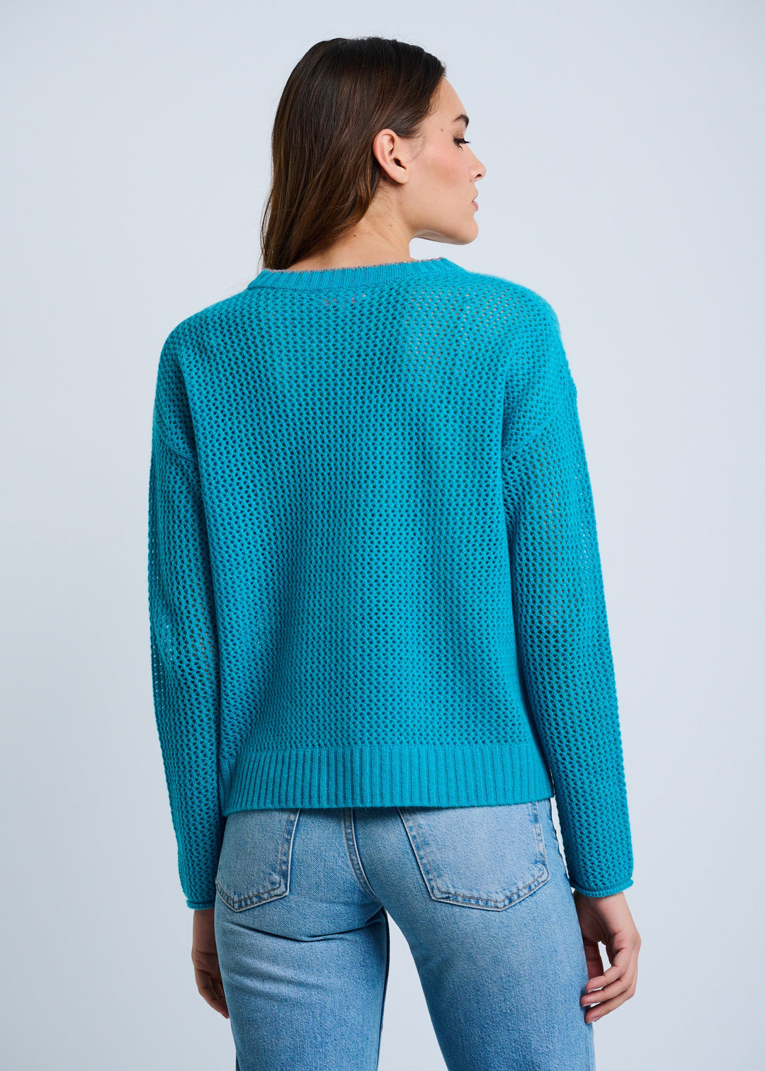 back view of plus size Lisa Todd Open For Love Waffle Knit Long Sleeve Sweater with Heart in Grotto