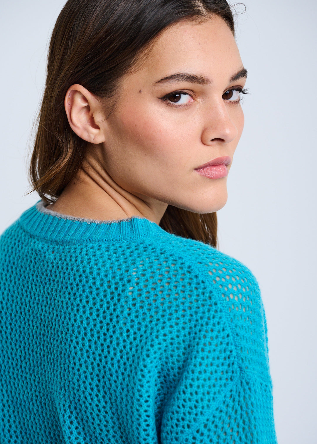 close up back view of plus size Lisa Todd Open For Love Waffle Knit Long Sleeve Sweater with Heart in Grotto