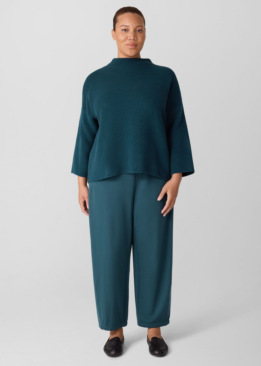 front view of plus size Eileen Fisher Peruvian Cot. Blend Funnel Neck Bracelet Slv. Sweater in Alpine