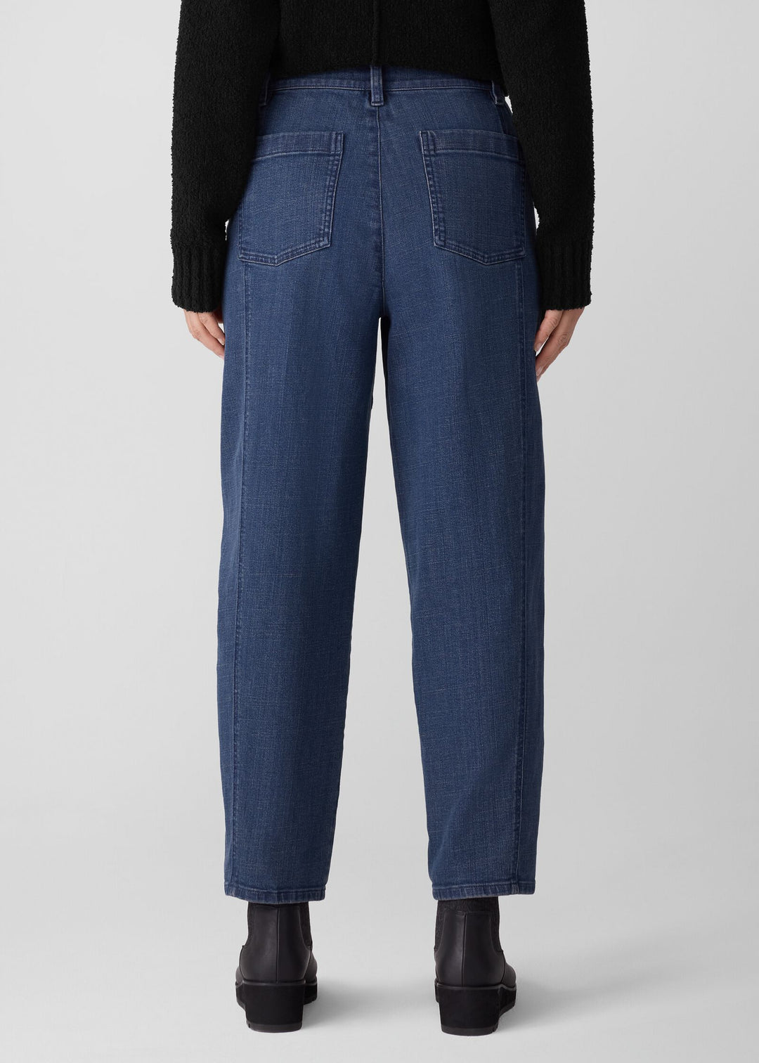 back view of plus size Eileen Fisher Cotton Str. Denim Ankle Lantern Jean in Med. Indigo
