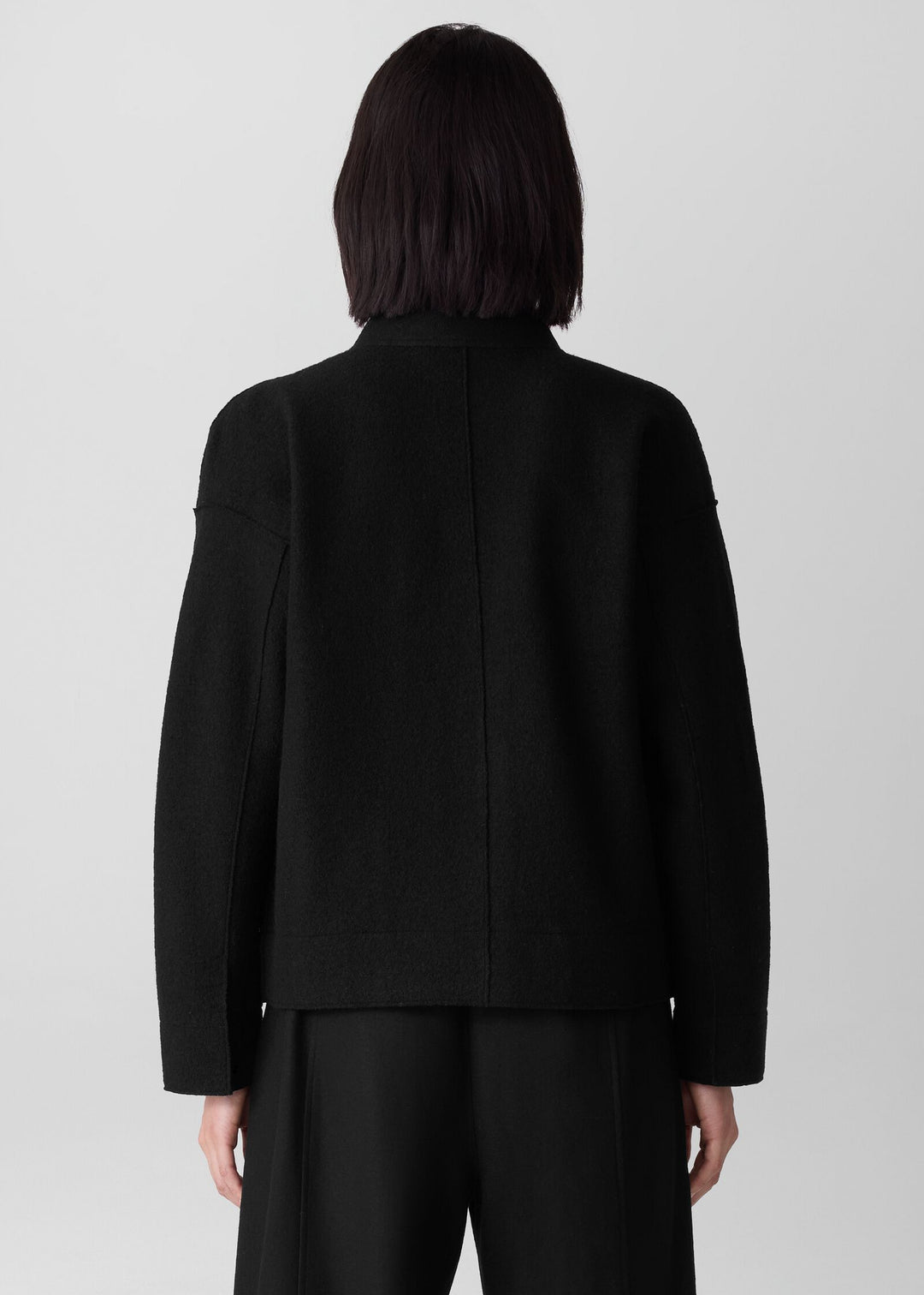 back view of plus size Eileen Fisher Light Weight Boiled Wool Stand Collar Jacket W. Pockets in Black