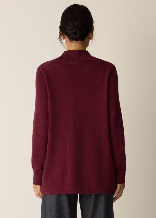 back view of plus size Eileen Fisher Cotton and Cashmere Turtleneck Tunic in Ruby