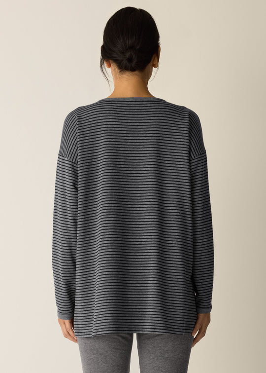 back view of plus size Eileen Fisher Striped Cozy Brushed Terry long Boxy Top in Black/Ash