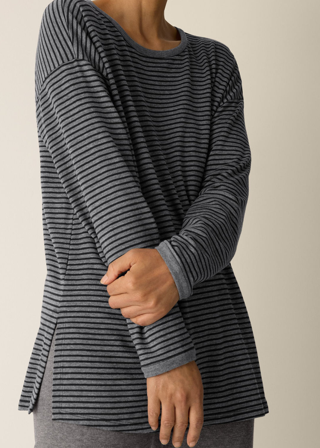 close up front view of plus size Eileen Fisher Striped Cozy Brushed Terry long Boxy Top in Black/Ash