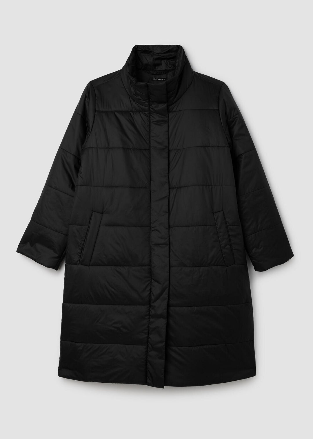 Black puffer coat on a light gray background