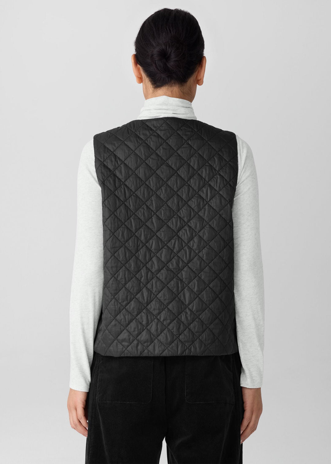 back view of plus size Eileen Fisher Eggshell Nylon V-Neck Vest with Snaps in Black