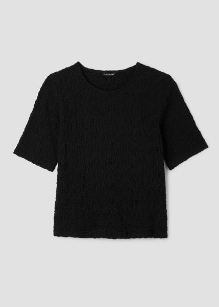 front view of plus size Eileen Fisher Bubble Texture Crew Neck Snug Top in Black