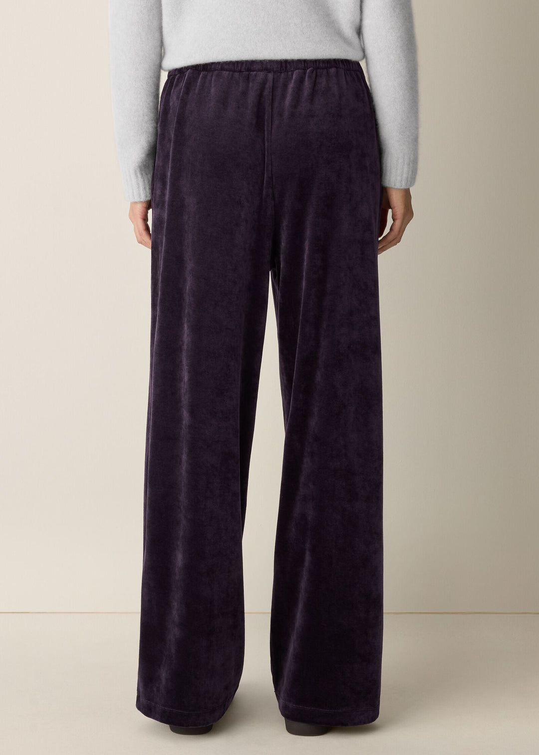 back view of plus size Eileen Fisher Cozy Velour Knit Wide Leg Full Length Drawstring Pant in Aubergine