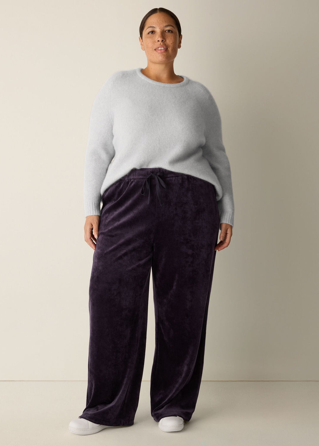 front view of plus size Eileen Fisher Cozy Velour Knit Wide Leg Full Length Drawstring Pant in Aubergine