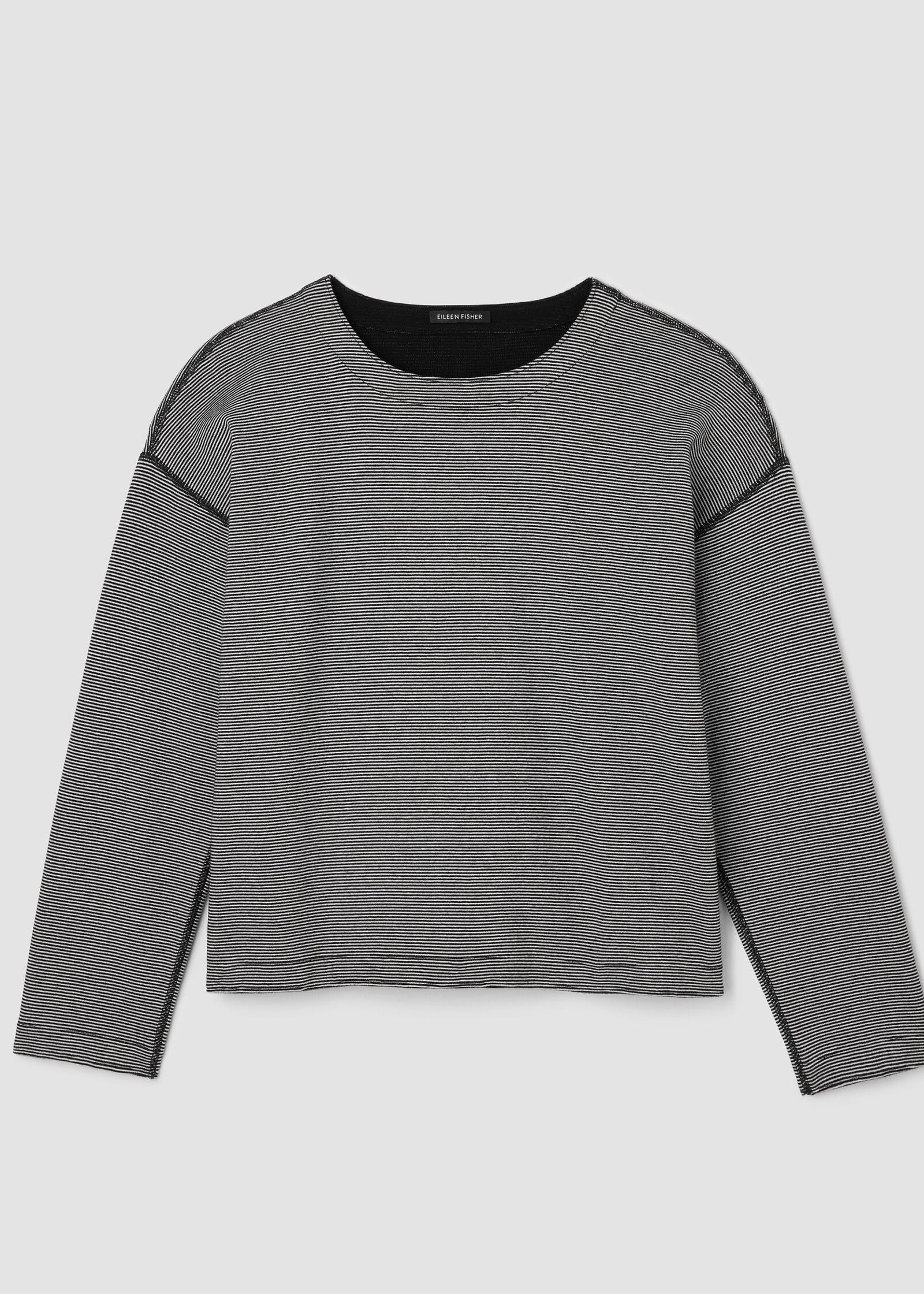 front view of plus size Eileen Fisher Double Knit Organic Cotton Round Neck Reversible Top in Black Ivory