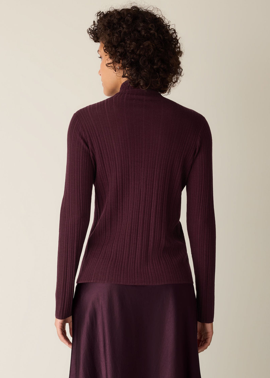 back of plus size Eileen Fisher Superfine Merino Long Sleeve Turtleneck in Wine