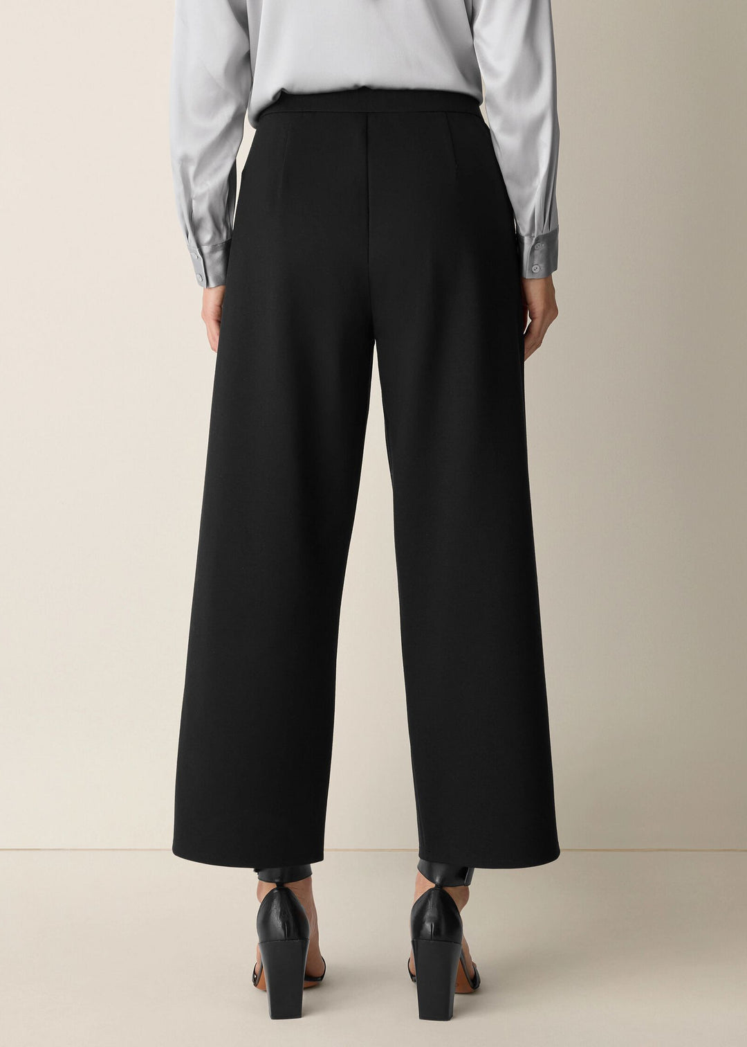 back view of plus size Eileen Fisher Washable Flex Ponte Wide Leg Ankle Pant in Black
