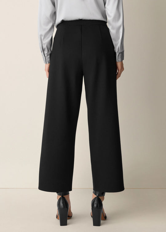 back view of plus size Eileen Fisher Washable Flex Ponte Wide Leg Ankle Pant in Black