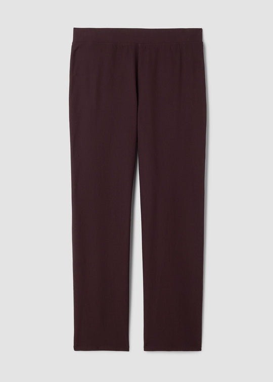Pair of maroon pants on a light gray background