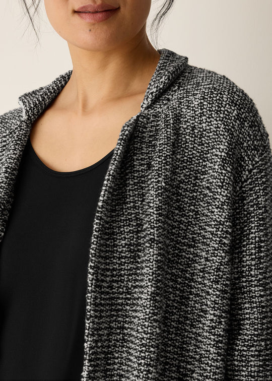 close up front view of plus size Eileen Fisher Peruvian Cotton Cloud Notch Collar Jacket in Black Soft White
