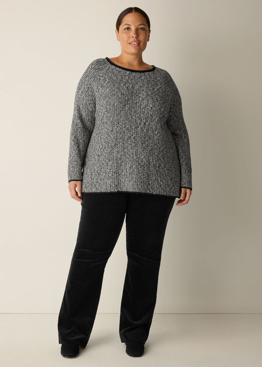 front view of plus size Eileen Fisher  Peruvian Cotton Cloud Jewel Neck Sweater in Black Soft White